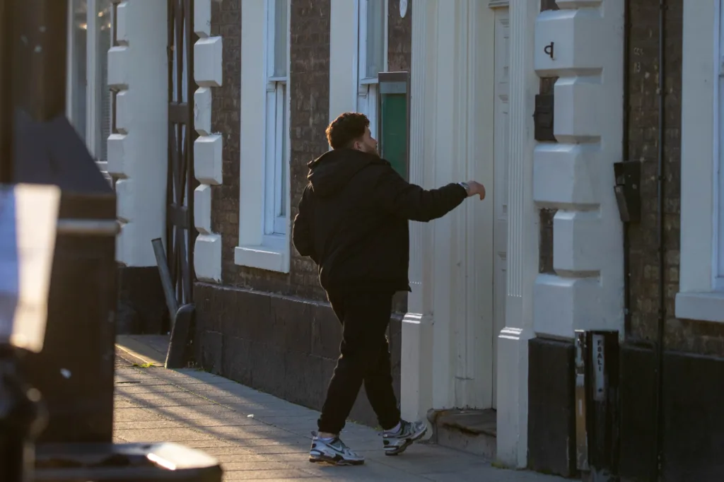 Windows open and lights on as people come and go at the Closed Rose and Crown Hotel. - News for Peterborough and Cambridgeshire News for Peterborough and Cambridgeshire -