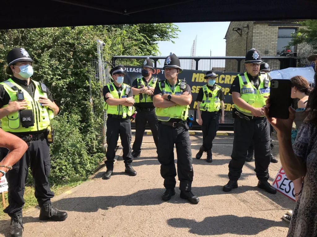 Cambridgeshire police warns Camp Beagle protestor for throwing flowers
