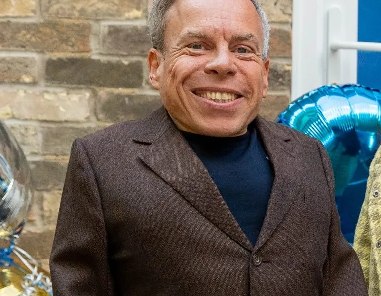 The film and tv star Warwick Davis is backing the campaign to save Great Gidding Church of England primary school near Sawtry from threatened closure.