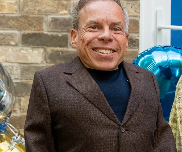 The film and tv star Warwick Davis is backing the campaign to save Great Gidding Church of England primary school near Sawtry from threatened closure.