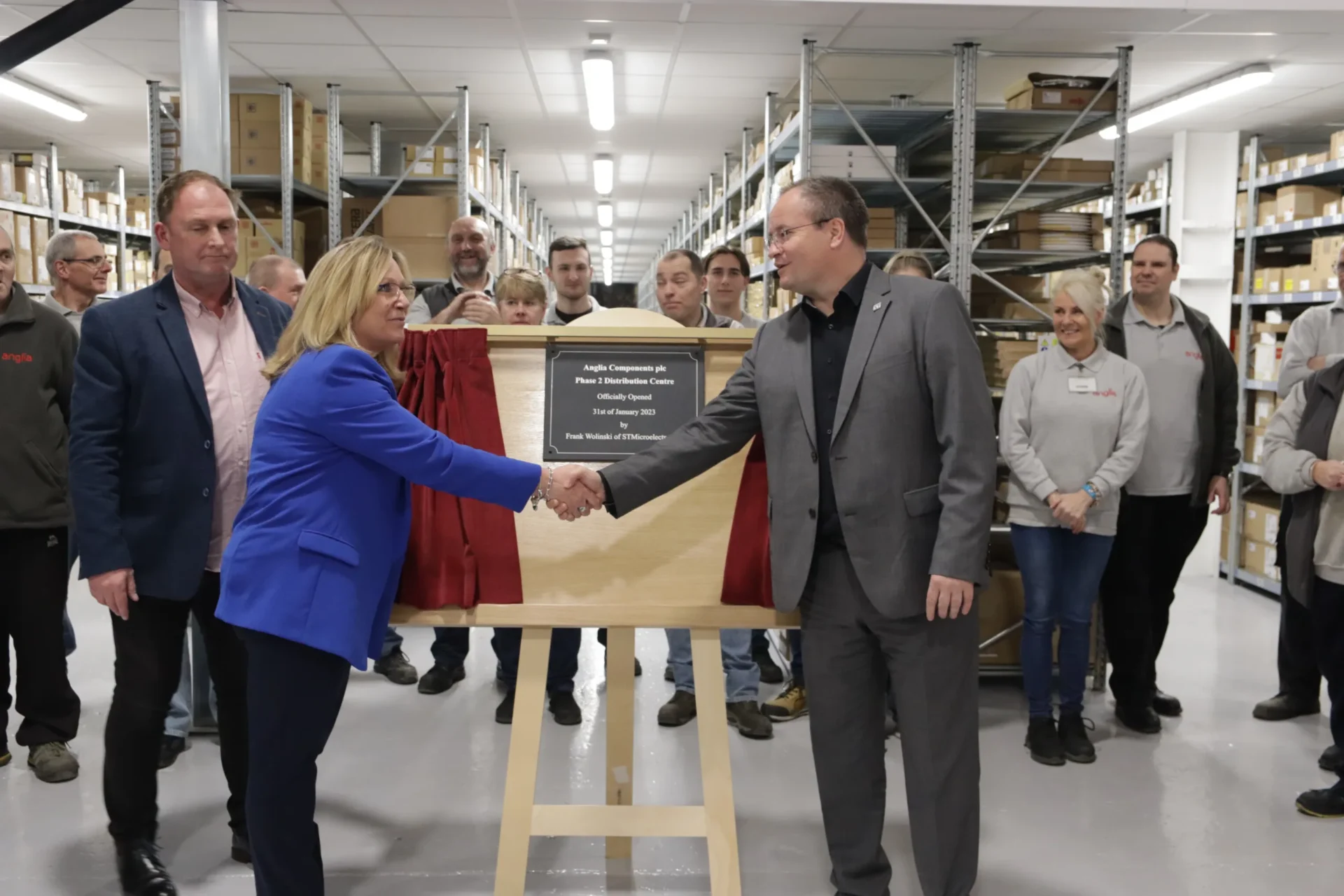 anglia - News for Peterborough and Cambridgeshire News for Peterborough and Cambridgeshire - From left to right: John Bowman, Marketing Director Anglia, Jill Bowie, Operations Director Anglia, Frank Wolinski, Region EMEA VP Channel Sales STMicroelectronics. Watched by the Anglia Distribution Centre team.
