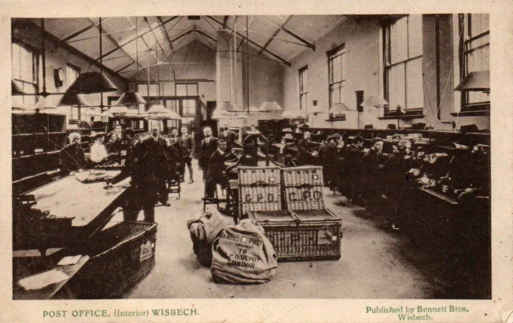 The post office was built in 1887 in 'French, mediaeval domestic style' in red brick with limestone dressings and slate roof.