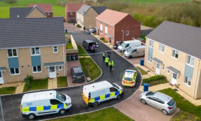 Scene of one of two murders in Cambridgeshire last night: police at a house in Meridian Close, Bluntisham, where the body of one of the victims was found at just after 9pm following reports reports of gunshots.