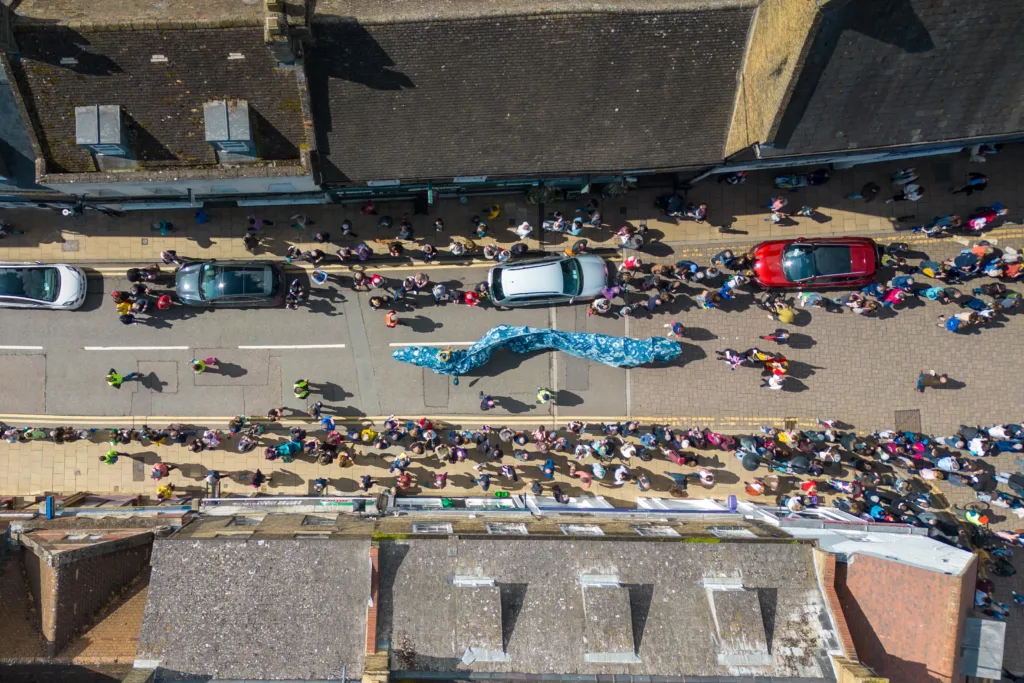 Dubbed ‘Coronation Eel Day’ the spectacular eel focal point snaked its way from Cross Green through the streets to Jubilee Gardens to begin a packed day of events by the river.