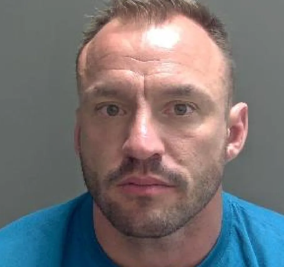Daniel Holyoak, 39, punched the victim numerous times, stamped all over her body, dragged her around by her hair and repeatedly slammed a door into her