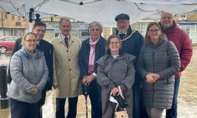 It never rains but it pours: Cllr Dee Laws, centre, at the official launch of the Whittlesey Heritage Walk last year. As portfolio holder for planning, she is dealing with the “bombshell” of Fenland Council splitting from Peterborough City Council.