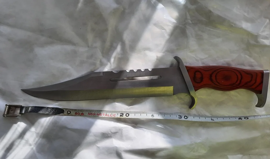 “During the search for the male, a large hunting 'RAMBO' style knife was located. “During the search for the male, a large hunting 'RAMBO' style knife was located.