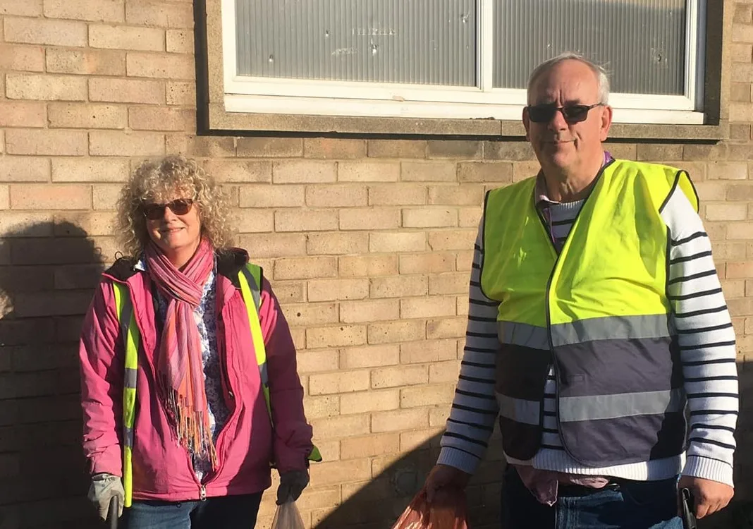 Cllr Dave Patrick with Ruth Freeman outside Walsoken Village Hall last year where they had undertaken a litter pick. Cllr Dave Patrick with Ruth Freeman outside Walsoken Village Hall last year where they had undertaken a litter pick.