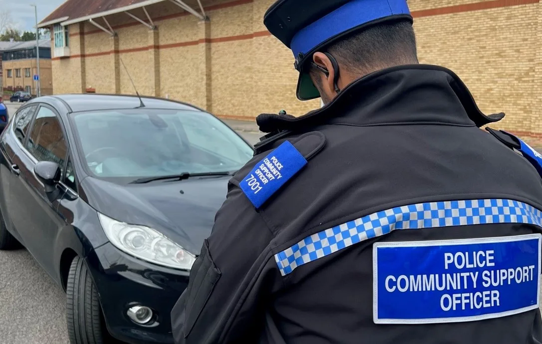 Gotcha! PCSO Ruben Borges gives a motorist a parking ticket in Huntingdon. Gotcha! PCSO Ruben Borges gives a motorist a parking ticket in Huntingdon.
