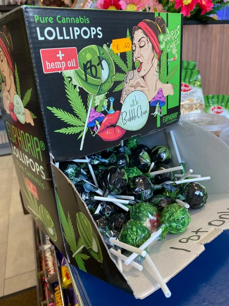 Cannabis lollipops were seized and tests later showed they contained Tetrahydrocannabinol (THC), a cannabinol derivative and component of cannabis-related material.
