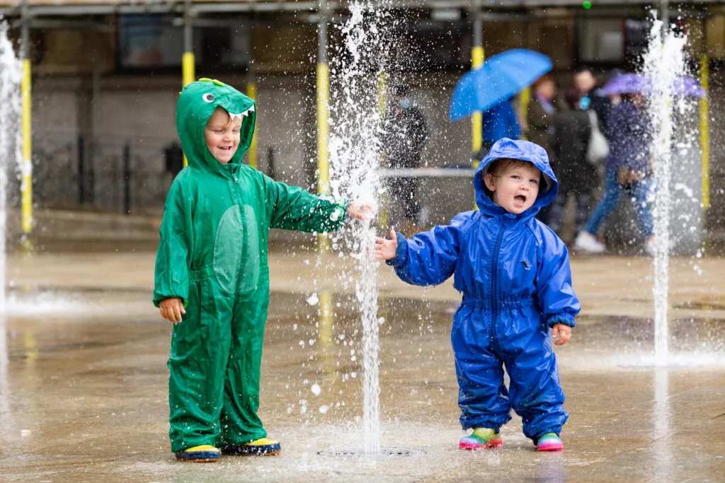 Flashback to 2021 and the fountains in Peterborough were particularly popular with these two youngsters. PHOTO: Terry Harris
