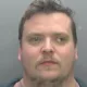 Christopher Downes, of Oak Crescent, Dry Drayton, was flagged up to police by the National Crime Agency (NCA) after a photo editing software account linked to him was used to alter the image.