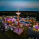 The fun fair arrives in Peterborough. Both aerial and ground level shots of different rides., City Centre, Peterborough Thursday 15 June 2023. Picture by Terry Harris.