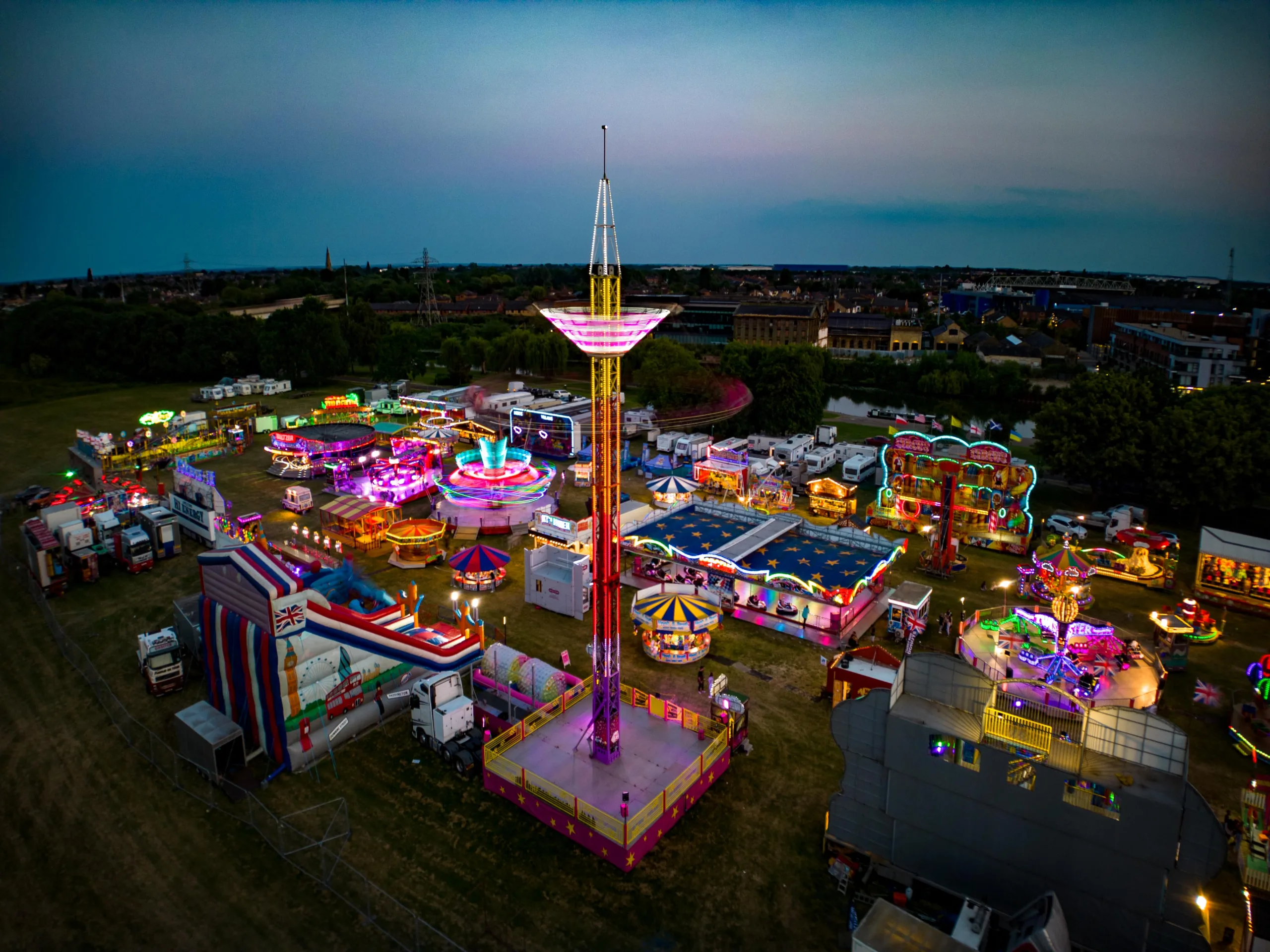 The fun fair arrives in Peterborough. Both aerial and ground level shots of different rides., City Centre, Peterborough Thursday 15 June 2023. Picture by Terry Harris.