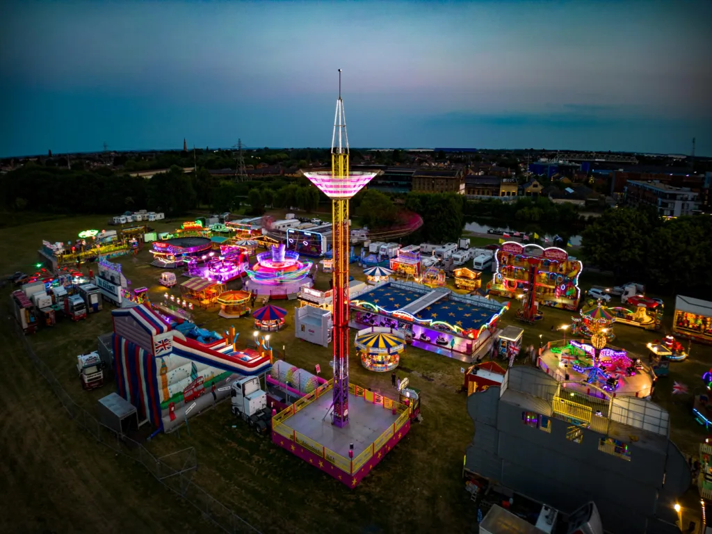 The fun fair arrives in Peterborough. Both aerial and ground level shots of different rides.,City Centre, Peterborough
Thursday 15 June 2023. 
Picture by Terry Harris.