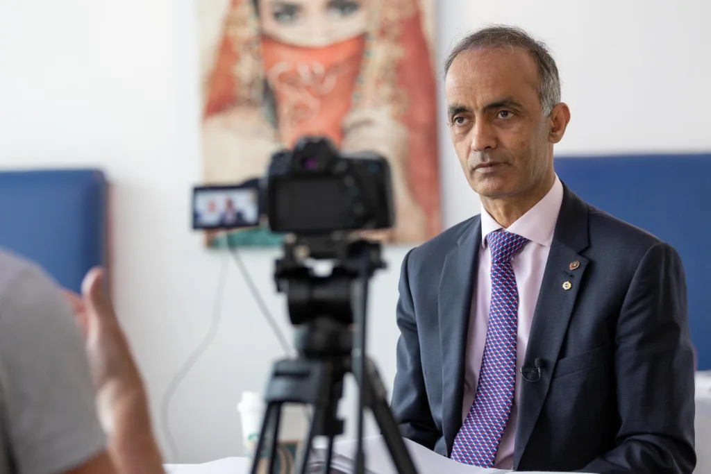 Councillor Mohammed Farooq taling to Paul Stainton,Hamtpton, Peterborough Tuesday 06 June 2023. Picture by Terry Harris.