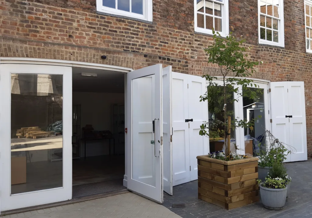 All visitors now enter Wisbech and Fenland Museum through the new garden opposite St Peter's Church tower on museum open hours, 10 - 4, Wednesday to Saturday. Photo: Wisbech Tweet