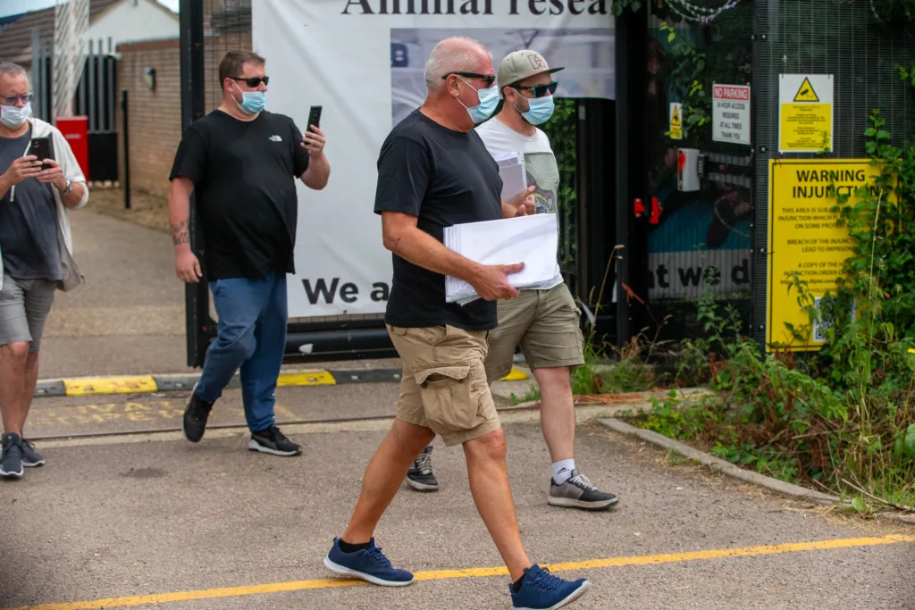 Babestation Zoe Grey and Stella Paris turn up to raise awareness of animal testing at MBR Acres, Bailiffs on behalf of Mills and Reeves throw papers at people in an attempt to serve them but just litter the highway. MBR Acres, Huntingdon Monday 10 July 2023. PHOTO: Terry Harris 