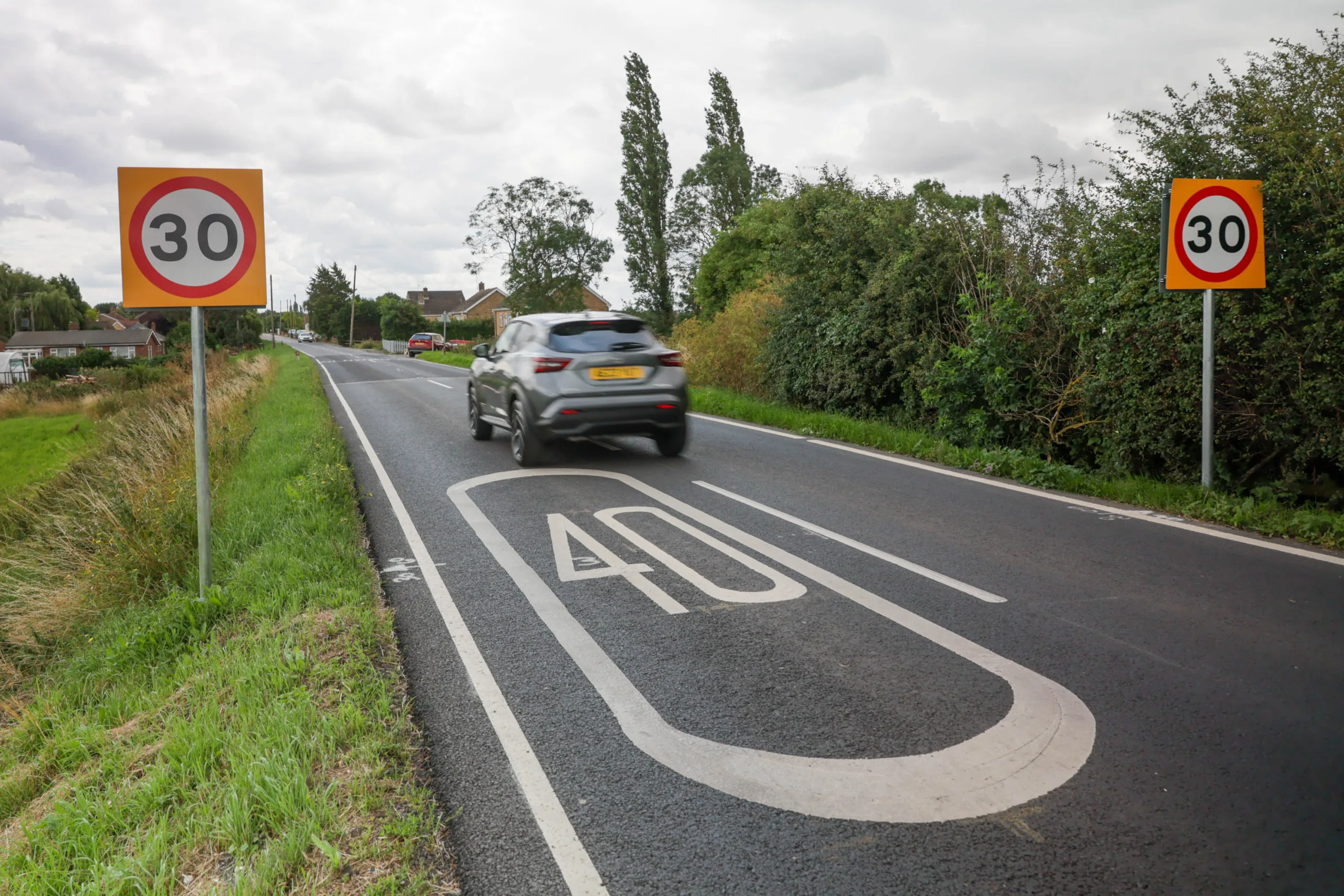 Which to choose: 30mph road signs or 40mph road marking? Drive into Murrow and you decide PHOTO: Terry Harris