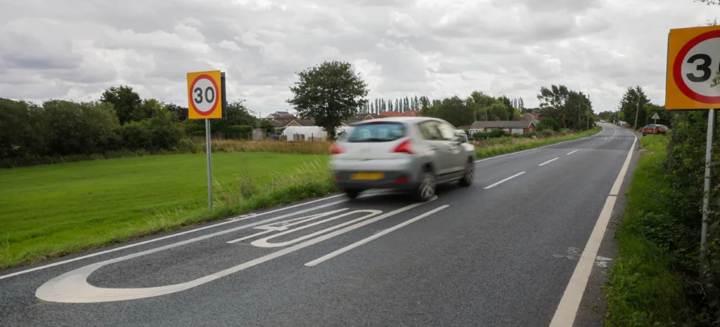 Which to choose: 30mph road signs or 40mph road marking? Drive into Murrow and you decide PHOTO: Terry Harris 