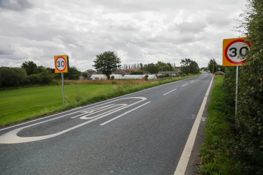 Which to choose: 30mph road signs or 40mph road marking? Drive into Murrow and you decide PHOTO: Terry Harris 