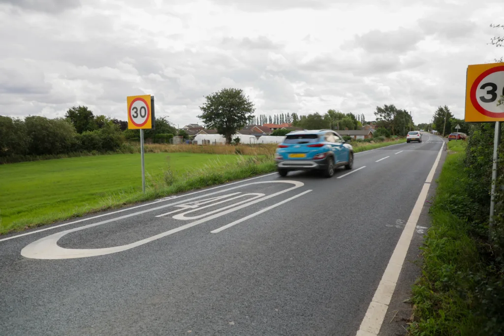 Which to choose: 30mph road signs or 40mph road marking? Drive into Murrow and you decide PHOTO: Terry Harris 