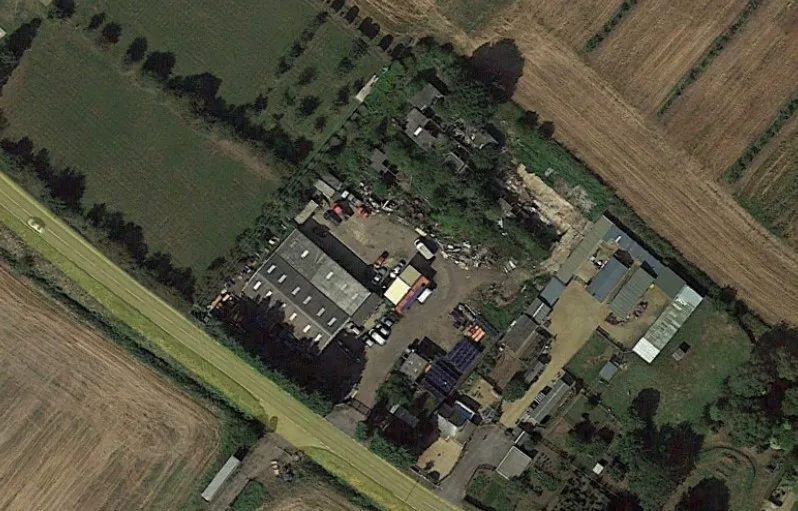 The former Piggery, a workshop, two shipping containers and a small derelict building located near the Ramsey Road/Milk and Water Drove frontage remain in situ, and these buildings are not subject to this retrospective application. IMAGE: Google The former Piggery, a workshop, two shipping containers and a small derelict building located near the Ramsey Road/Milk and Water Drove frontage remain in situ, and these buildings are not subject to this retrospective application. IMAGE: Google