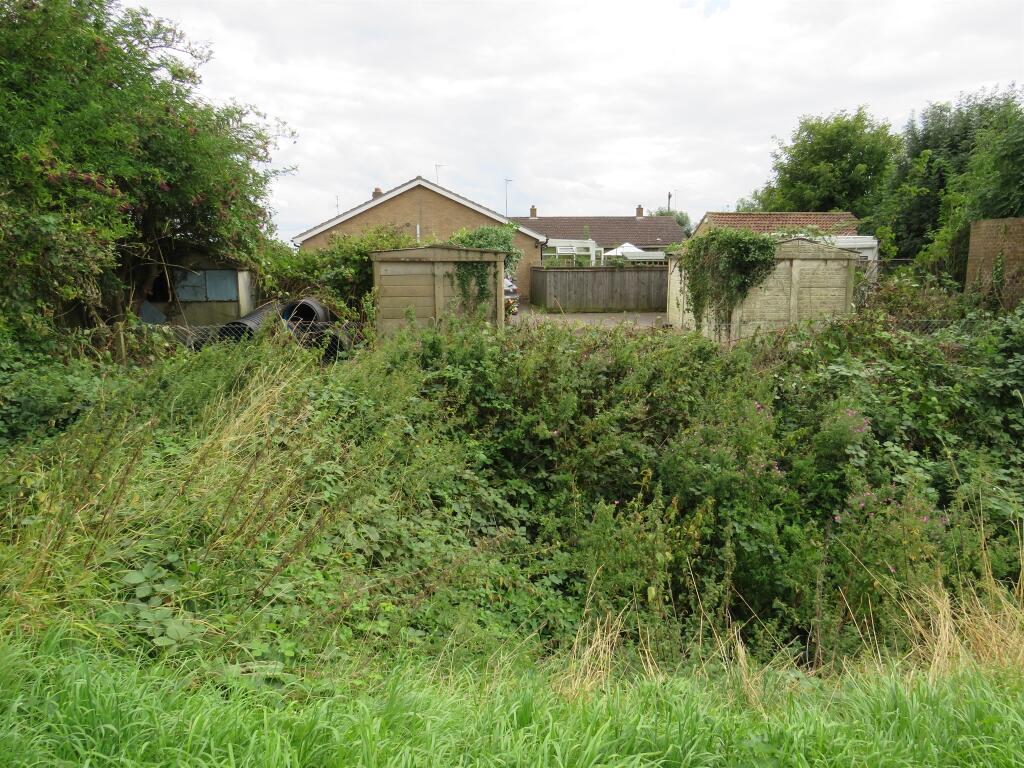 Fenland Council leader Chris Boden (top left) says the council was not ‘short changed’ when it sold this land at Murrow for £8,000 at auction in 2019. It has now gone on sale, with permission for one house, for £95,000.