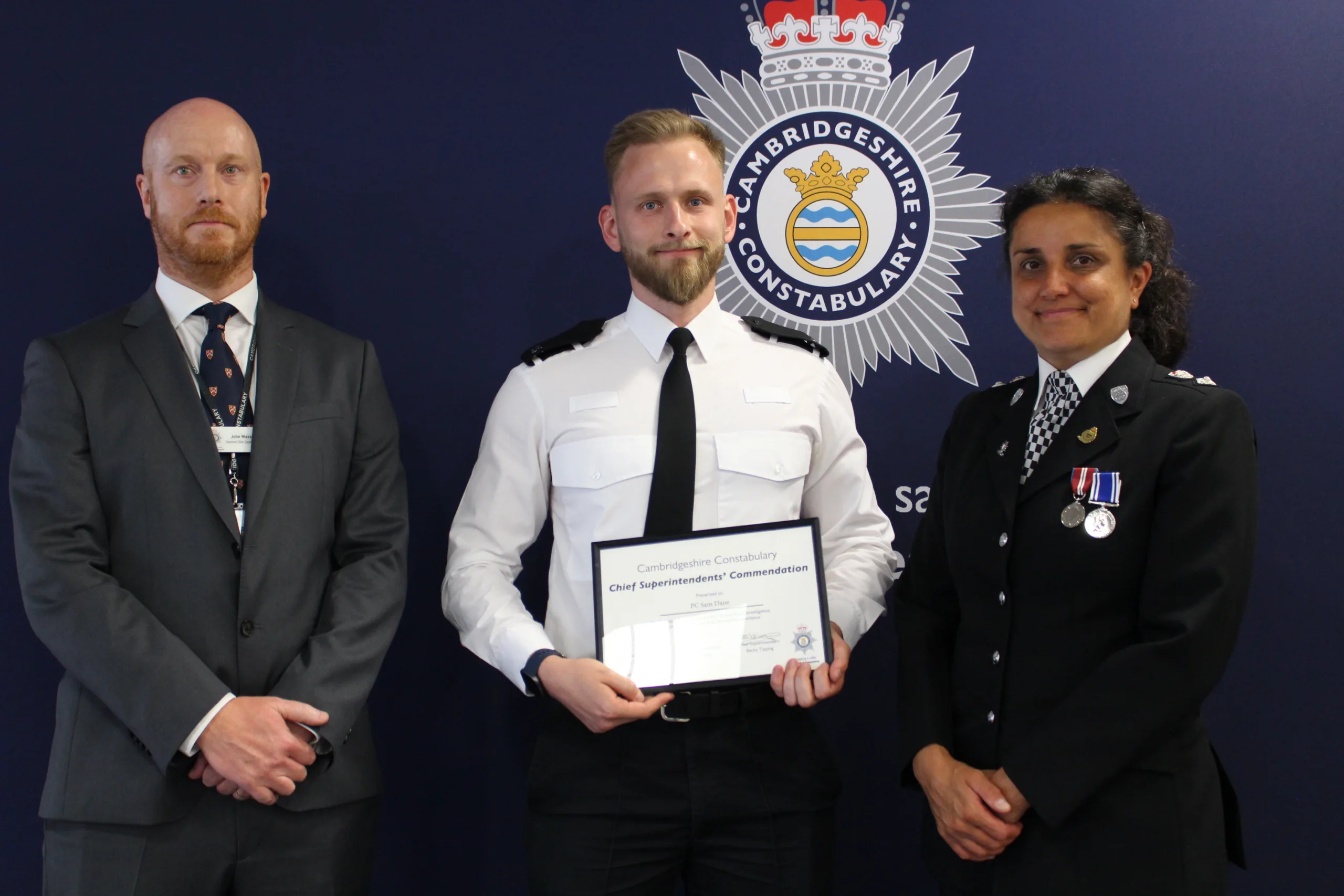 Pc Dane is pictured with Chief Superintendents Jon Hutchinson and Becky Tipping Pc Dane is pictured with Chief Superintendents Jon Hutchinson and Becky Tipping