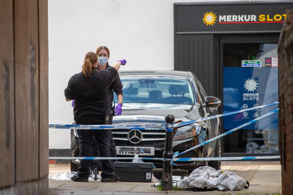 Grim scenes in Wisbech today as a cordon remained in place following a stabbing in or near The Globe public house last night. PHOTO: Terry Harris 