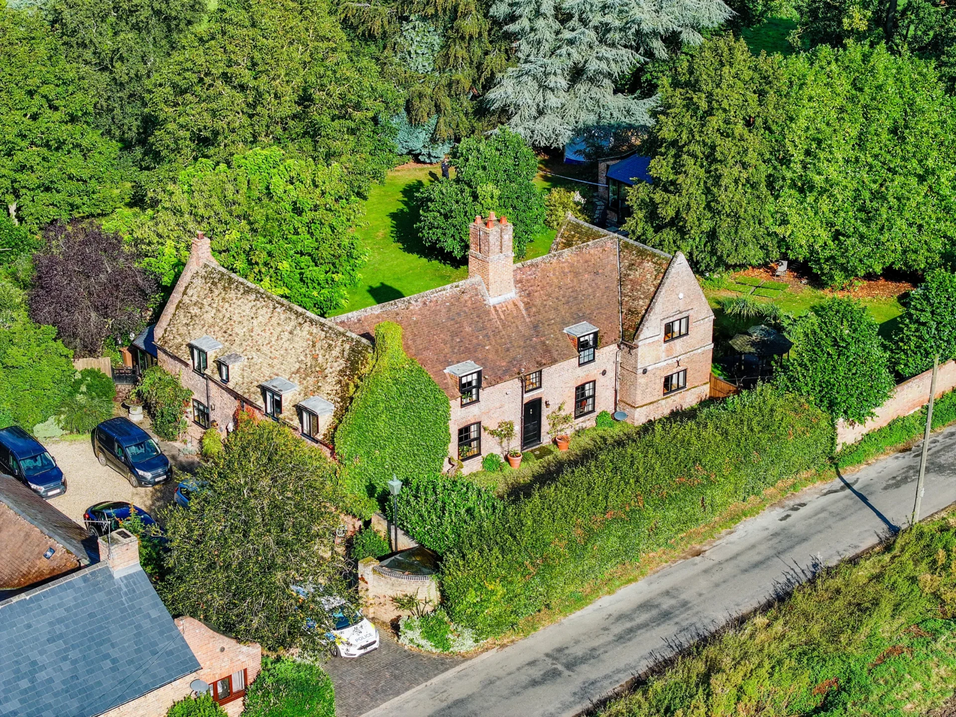 News for Peterborough and Cambridgeshire - Police at Banyer Hall, Emneth, following the death. Aerial shot of house. PHOTO: Terry Harris