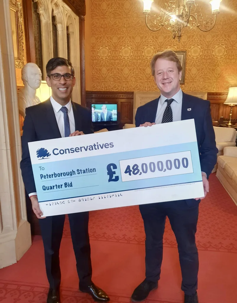No 10 here we come - MP Paul Bristow poses with the 'flouncing cheque' with the Prime Minister