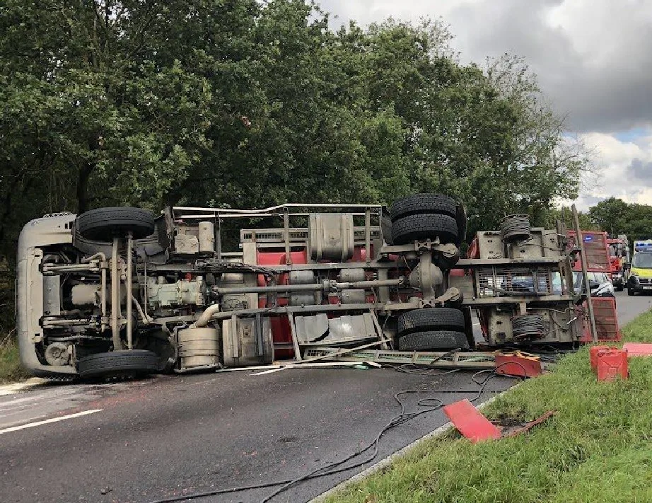 A505 Cambridgeshire: Road closed after crash and lorry overturns