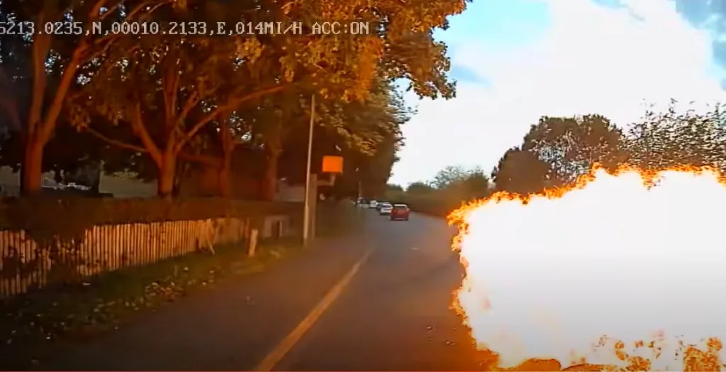 Stavius Gordon flipped off his motor bike as it burst into flames causing damage to the Audi and a nearby private ambulance. 