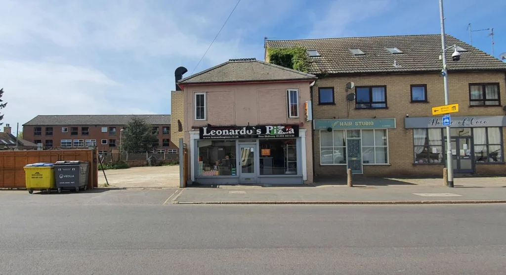 Current view of Leonard’s Pizza and the building which will be demolished to open the way to a new development of 7 flats and two commercial units. 