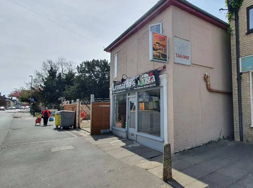 Current view of Leonard’s Pizza and the building which will be demolished to open the way to a new development of 7 flats and two commercial units. 