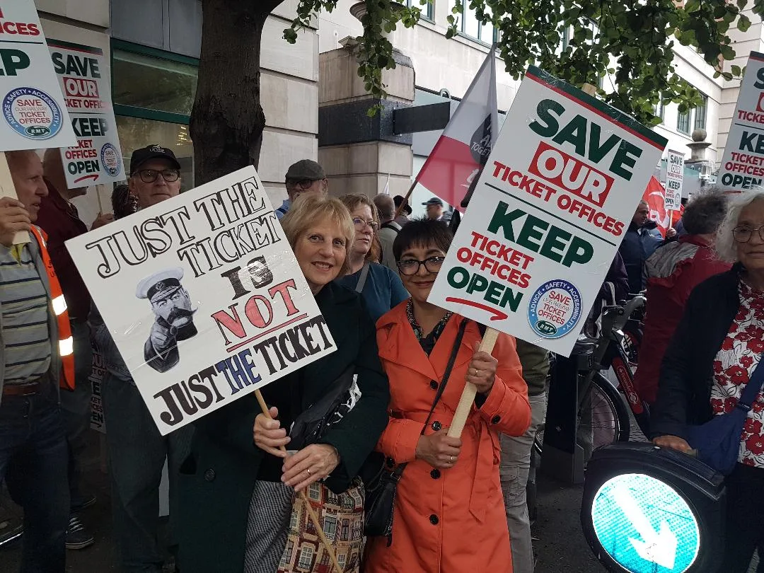 Angela Singer and Amanda Taylor on the march. An estimated 1,000 people – one for every ticket office facing closure - marched for the cause this summer. Angela Singer and Amanda Taylor on the march. On Thursday, an estimated 1,000 people – one for every ticket office facing closure - marched for the cause.