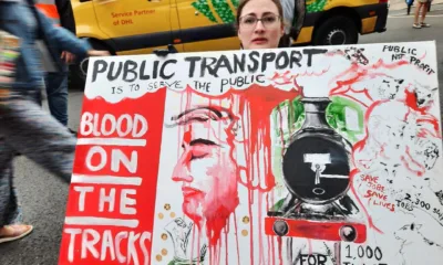 Blood on the line - a protestor in a wheelchair with her placard. On Thursday, an estimated 1,000 people – one for every ticket office facing closure - marched for the cause.
