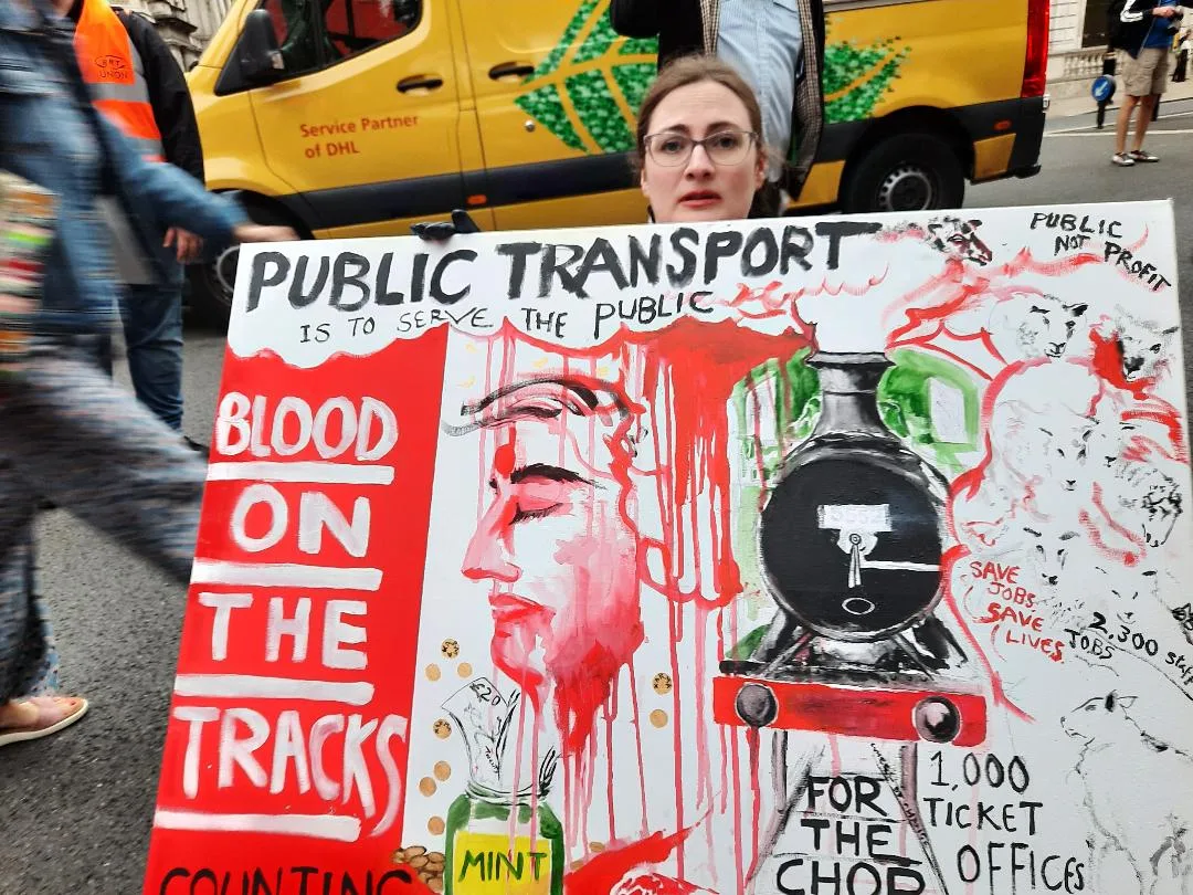 Blood on the line - a protestor in a wheelchair with her placard. On Thursday, an estimated 1,000 people – one for every ticket office facing closure - marched for the cause.
Blood on the line - a protestor in a wheelchair with her placard. On Thursday, an estimated 1,000 people – one for every ticket office facing closure - marched for the cause.