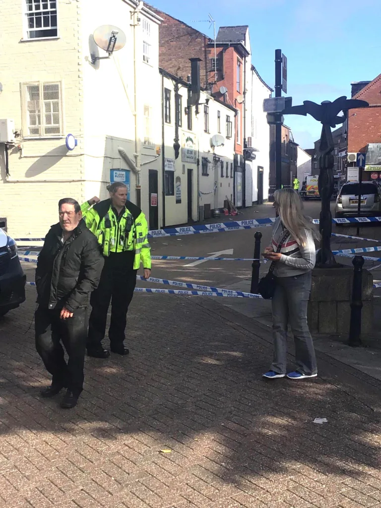 This is the scene confronting visitors and shoppers to Wisbech today. The photos show a police presence in the town and a pub and other businesses cordoned off. 