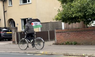 The cyclist was spotted in Stanground riding up and down the streets with a Friends of Al-Aqsa (FOA) flag held high.