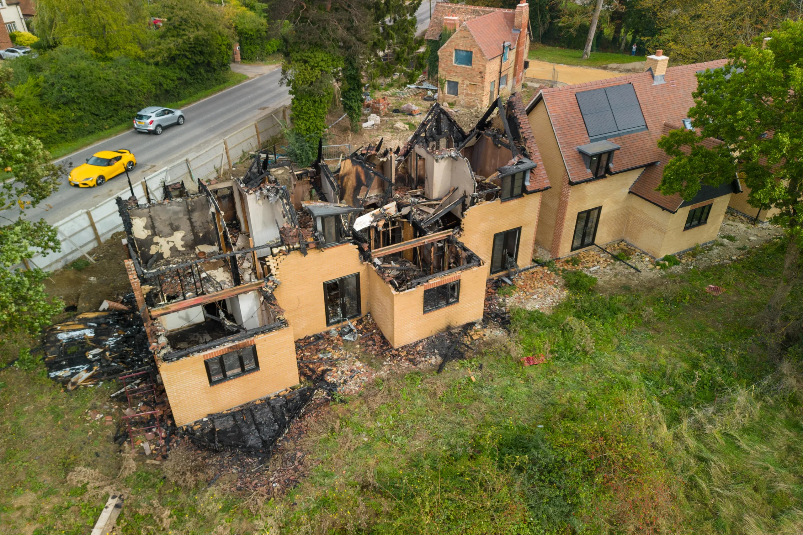 Police are working closely with fire service investigators after fire destroyed two new homes in St Ives in an arson attack. PHOTO: Terry Harris