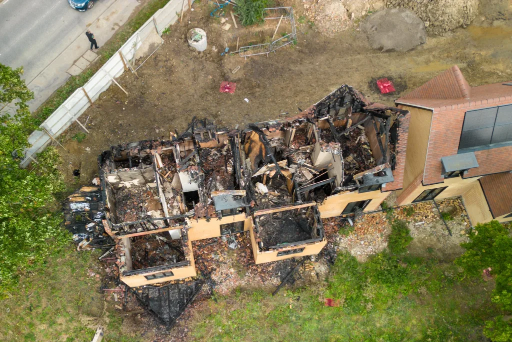 Police are working closely with fire service investigators after fire destroyed two new homes in St Ives in an arson attack. PHOTO: Terry Harris