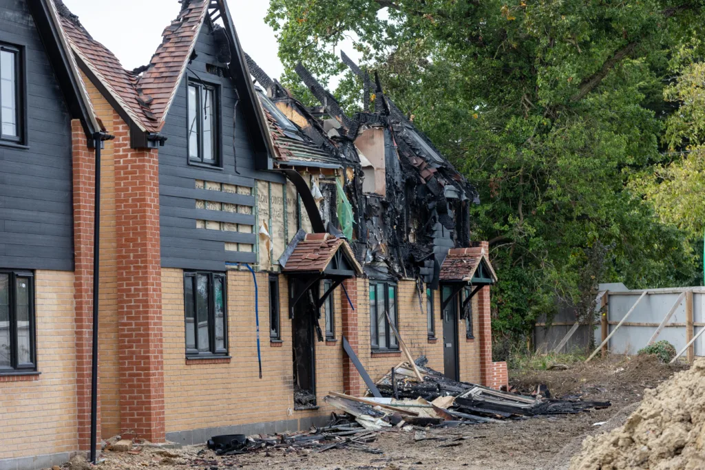 Police are working closely with fire service investigators after fire destroyed two new homes in St Ives in an arson attack. PHOTO: Terry Harris