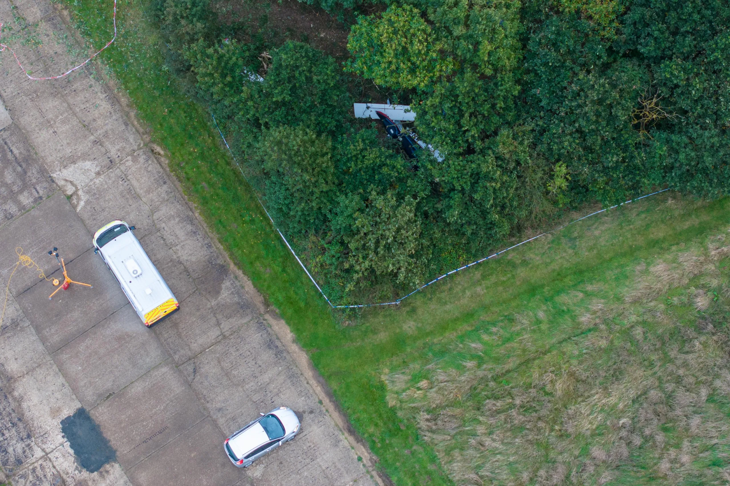 Police at scene of plane crash Langham Airfield in Norfolk. Emergency services were called after reports of the four-seater light aircraft crash at Langham Airfield at 3.40pm yesterday (10/9/23)., Langham Airfield, Langham Wednesday 11 October 2023. Picture by Terry Harris