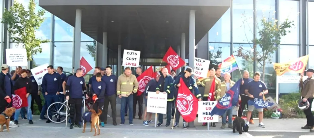 Cambridgeshire Fire Brigade Union stage protest outside New Shire Hall, Alconbury, over cuts to crews they say could ‘end in tragedy’. PHOTO: Cambs FBU 