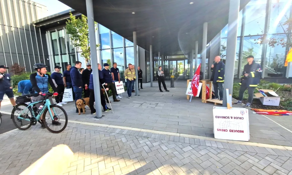 Cambridgeshire Fire Brigade Union stage protest outside New Shire Hall, Alconbury, over cuts to crews they say could ‘end in tragedy’. PHOTO: Cambs FBU