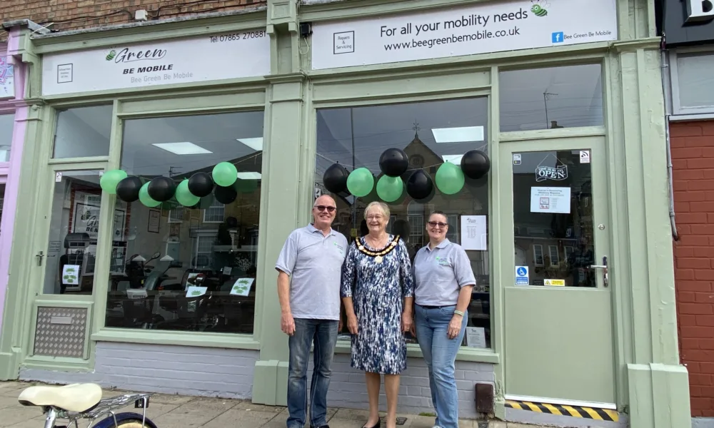 Sean and Heidi welcome the Mayor of Whittlesey, Cllr Kay Mayor, to their new mobility scooter shop in Broad Street