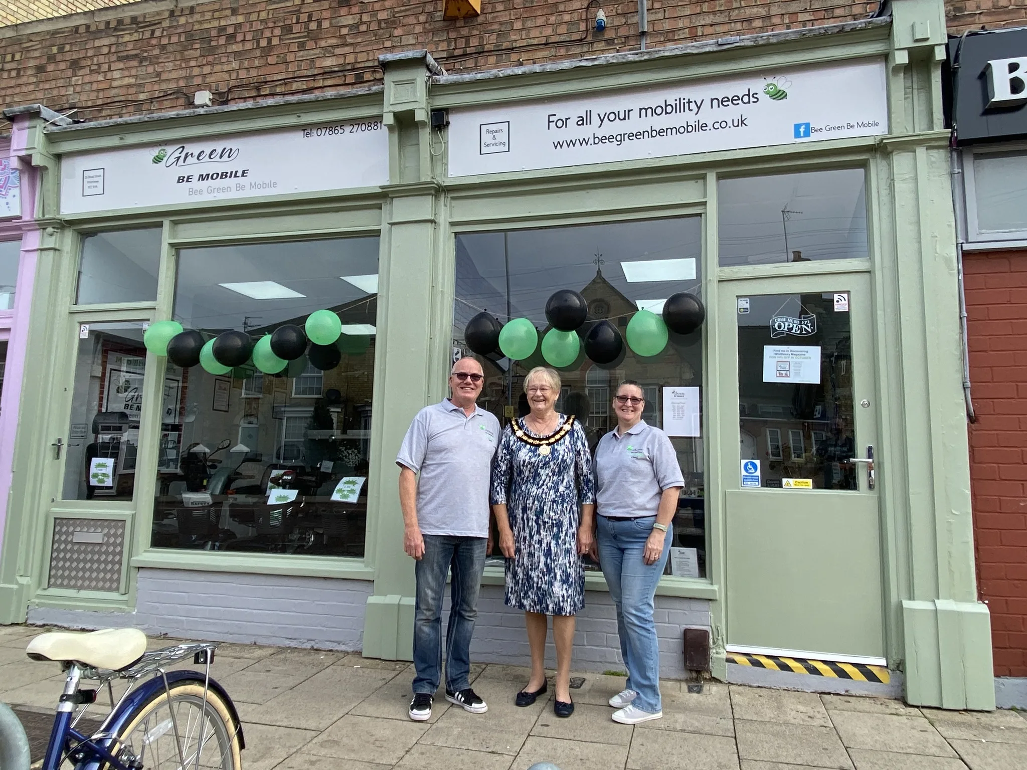 Sean and Heidi welcome the Mayor of Whittlesey, Cllr Kay Mayor, to their new mobility scooter shop in Broad Street