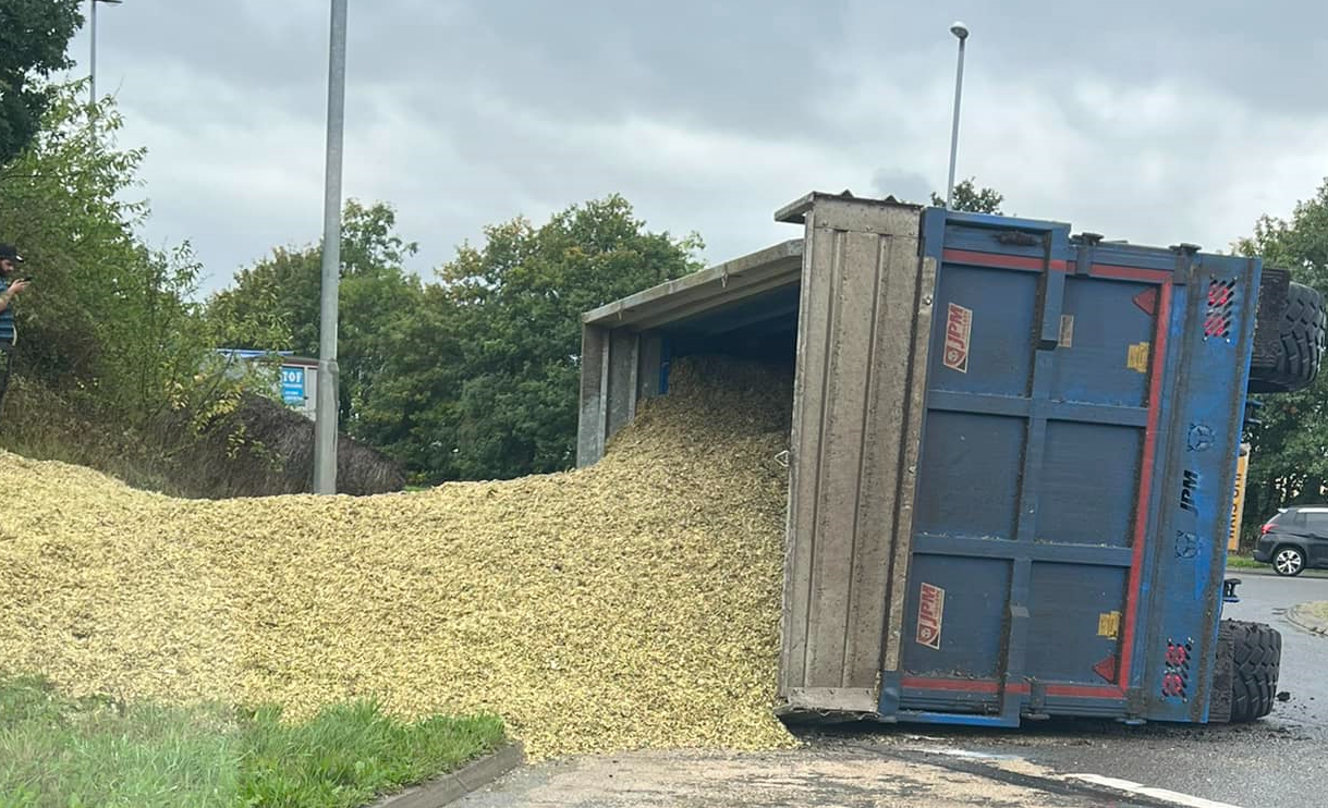 This tractor and trailer unit carrying chopped maize overturned at Littleport yesterday but fortunately eye witnesses said the driver escaped injury. PHOTO: CambsNews reader Justin Cooper This tractor and trailer unit carrying chopped maize overturned at Littleport yesterday but fortunately eye witnesses said the driver escaped injury. PHOTO: CambsNews reader Justin Cooper